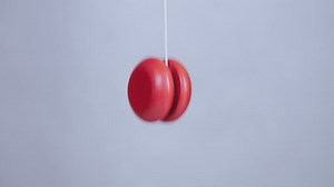 Playing yo-yo close up in slow motion