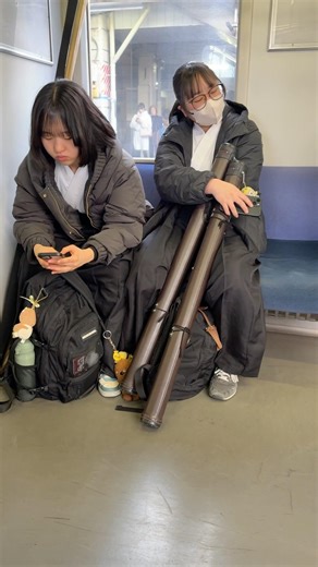 Japanese girls travel to school by train