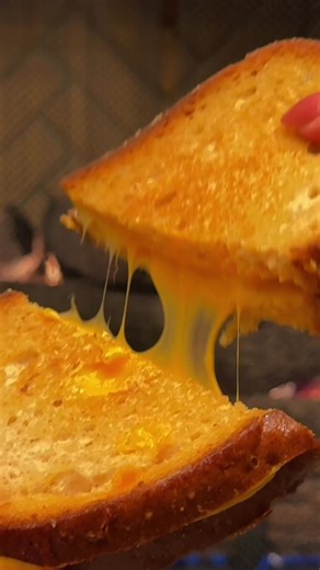 Does it get any cozier than an ooey gooey grilled cheese by the fire? #hygge
