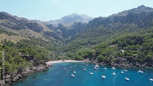 Cala Tuent Bay with Yachts Anchored in Mallorca's Serene Mountainous Coastline