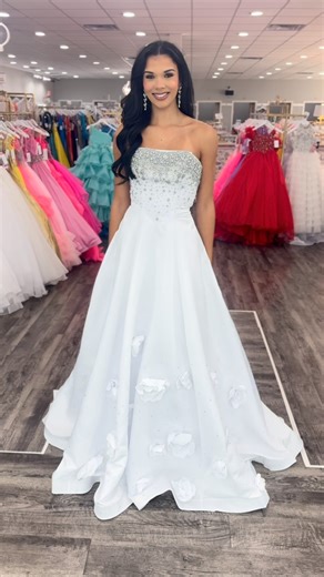 White or Blue?🤍💎 We're obsessed with BOTH✨ This @avapresleydesigns pageant gown is so stunning with the rosettes on the bottom 🌹Take the crown in your next pageant in a Glitz & Gowns pageant gown🥳 • • • #pageant #pageantdress | Glitz & Gowns