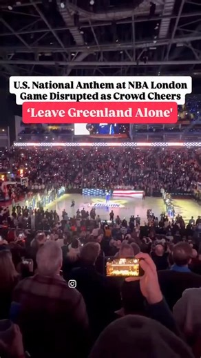 International_Guruji🌍 on Instagram: "U.S. National Anthem Disrupted at NBA London Game Amid Greenland Tensions! Mounting political tensions between Europe and the United States spilled into the sporting arena on Sunday when the U.S. national anthem was disrupted at an NBA game in London. As actor and singer Vanessa Williams performed The Star-Spangled Banner at the O2 Arena ahead of the Memphis Grizzlies vs Orlando Magic game, a member of the crowd shouted “Leave Greenland alone,” interrupting