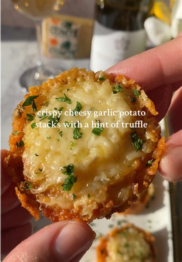 If you love crispy potatoes, these potato stacks are a must try🤌🏼 #recipe #potato #appetizer #fyp Ingredients (Makes 12) 4 large yukon gold potatoes (peeled) 1 1/2 cup grated Comté or Gruyère cheese 3 tbsp butter 2tbsp minced garlic 1 tsp dried thyme 2 tbsp parsley 1 tsp chives 1tbsp truffle oil Salt and pepper to taste Recipe 1. Preheat oven to 375F & lightly grease 12 cup muffin tin. 2. Slice potatoes using a mandolin or knife (about 1/8 inch) & place them in a bowl. 3. In small bowl mix mel