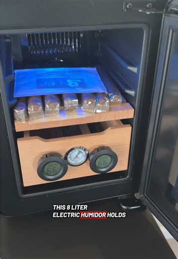 This 8 liter Electric Humidor holds up to 80 sticks of different sizes, the shelve and drawer are cedar wood, it includes a hygrometer to monitor humidity and a water canister to season it! It is the perfect way to maintain your sticks fresh and in perfect condition! #humidor #electrichumidor
