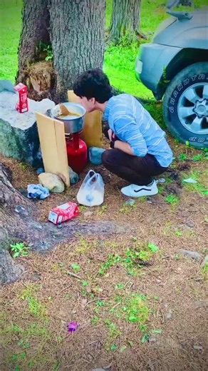 Outdoor Cooking with a Large Metal Pot