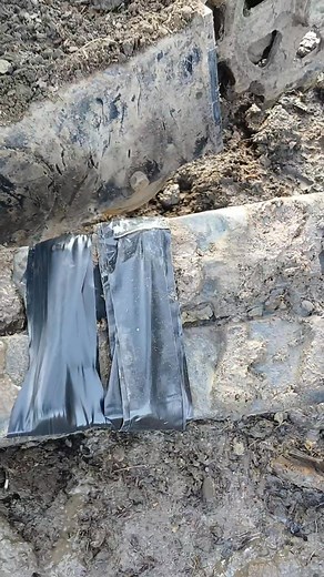 Gorilla tape is still holding in the muddy rocky steep ground but the roll of electrical tape finally gave out | Adam Perry
