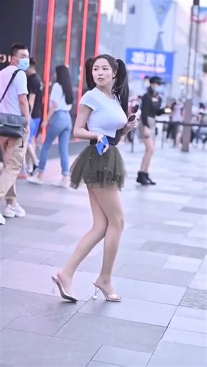 City Street Fashion: Asian Girl in Chic Outfit