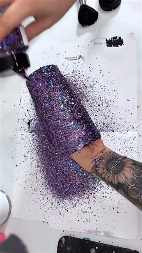 Ivette Moreno on Instagram: "Black and purple holographic chunky glitter on a 20 oz tumbler. #glittertumblers #diycraft #craftinspiration"