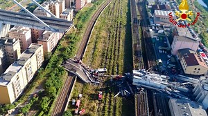 New drone footage shows the extent of damage from Tuesday's bridge collapse in Genoa, Italy. Read more: https://nyti.ms/2MpzrEB | Video From The New York Times