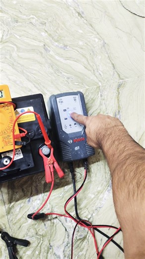 How to revive a drained car battery | c7 Bosch car charger no charging issue resolved (English)