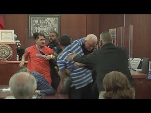 Video: Fight breaks out between families in Houston courtroom after man pleads guilty to murder
