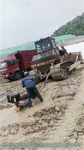 "Truck to the Rescue: How a Loader Pulls an Electric Bike from the Mud"