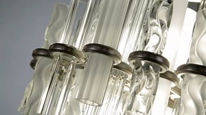 Celebrating the Art Deco glamour of the New York City skyline, Corbett Lighting's Manhattan is an upscale LED pendant that channels big city sophistication. #corbettlighting | LargerThanLight