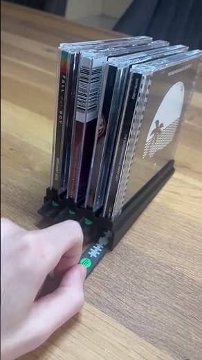 Discover our new 3D-printed CD holder with a hidden Spotify code underneath. #3dprinted #design