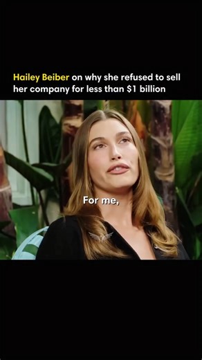 Fly High on Instagram: "Hailey Bieber always said she wouldn’t sell her company for anything less than a billion dollars. That was the benchmark she set long before a real offer ever came her way. In May 2025 e.l.f. Beauty bought it for exactly that. The deal includes $800 million upfront and up to $200 million in earnouts, with Hailey staying on as Chief Creative Officer. Rhode’s rise shows how fast a social-media-driven beauty brand can scale, becoming one of the rare celebrity startups to hit