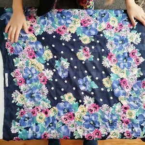 A wrapping cloth tutorial from our 9-year-old friend. No furoshiki? No problem! Any scarf will do! #goodbye #trash #hello #reusable #giftwrap | Kiss Naturals