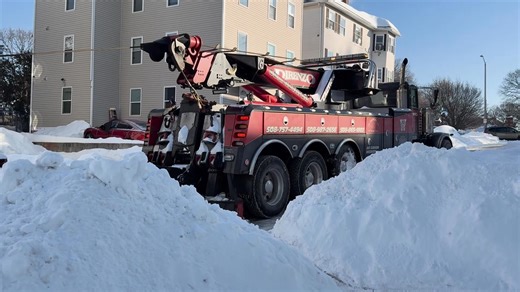 New this morning: DiRenzo's Towing pulling out a Worcester Public Schools - Worcester, MA bus from a snowbank at the corner of Arlington and Pattison Streets on #VernonHill. Tow truck operator told Spectrum News 1 it's the second bus he's extracted from a #snowbank this morning. | Spectrum News 1 Worcester