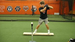 One of the best ways to teach a hitter how to remain balanced through their swing. READ MORE󾮚 We use this drill when a player is overly aggressive with their body. The purpose of the drill is to keep them in an athletic position with their knees bent and on the balls of their feet. One tendency for a hitter during the drill is to stand tall because they feel it keeps them balanced on the board. Preventing this from happening, take a picture or use a mirror to adjust them on the board. Another c