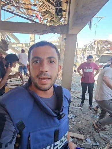 NEWS: 21 martyrs and dozens of injuries after the Israeli occupation targeted al-Baqa cafe on the seaside street, western Gaza City. The bombing left a huge crater with people scrambling to find loved ones or what remains of them.