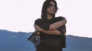 Female model in a outdoors photoshoot - Free Stock Video