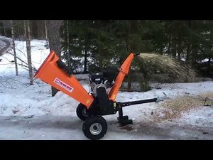 Tow behind wood chipper in action Iron Baltic