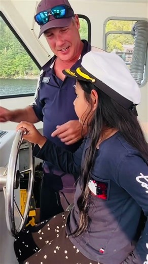 Little girl driving a cruise ship 🚢 in the lake tremblant, Quebec.