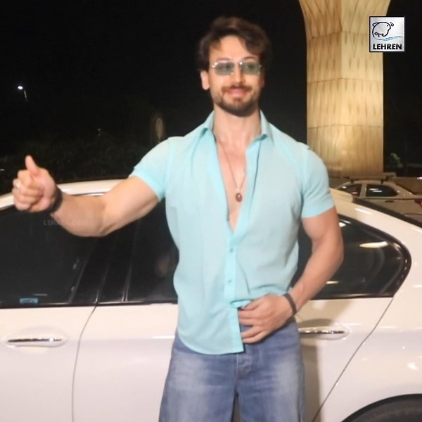 Tiger Shroff looks dashing in a light green half-sleeved shirt paired with baggy jeans as he jets off to Abu Dhabi for IIFA awards 2022. #TigerShroff ##TigerShroffIIFA #IIFA #IIFAawards #IIFA2022 | Lehren