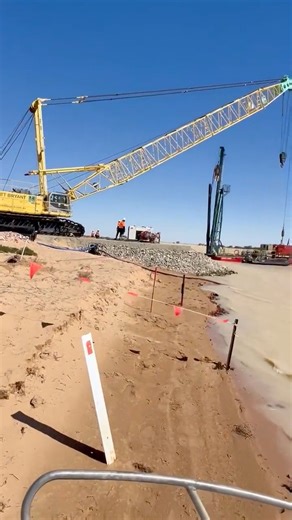 29th August 2025 Update from the Birdsville Track (bypass track) and Cooper Creek crossing. Thanks to Phil Dunn from Dunn’s Earthmoving for providing footage of the preparatory work in preparation for installing the new barge at the crossing. The barge (no eta as yet) will be sufficiently large to transport loaded B double cattle trucks across the Cooper Creek while in flood. There is still a significant amount of floodwater above the crossing to flow past and down to Kati Thanda -Lake Eyre. | A