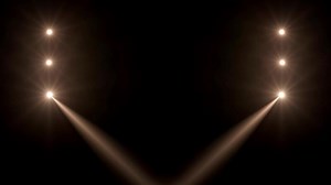 Download Spotlight optical lens flares overlay shine effect on a black background. for free