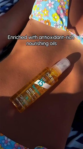 The DistrIQt | Noreva Bergasol Dry Oil SPF 15: Glowing, Protected Summer Skin
