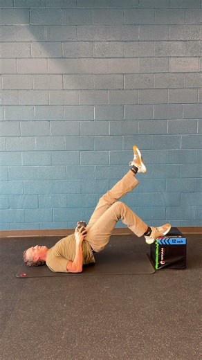Dumbbell Elevated Foot Single Leg Glute Bridge