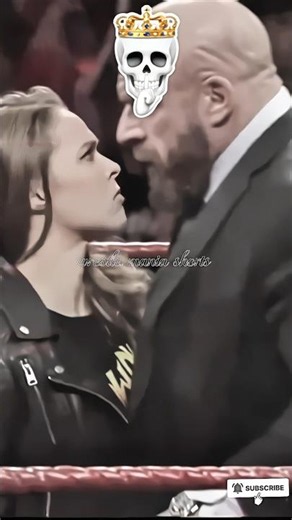 Triple H vs. Ronda Rousey: The Most Intense Stare-Down! 🚨