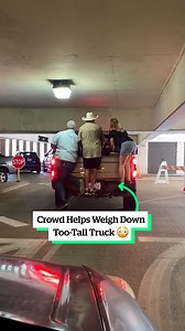 Crowd helps a truck escape from a low parking garage 👏🚛 | VT