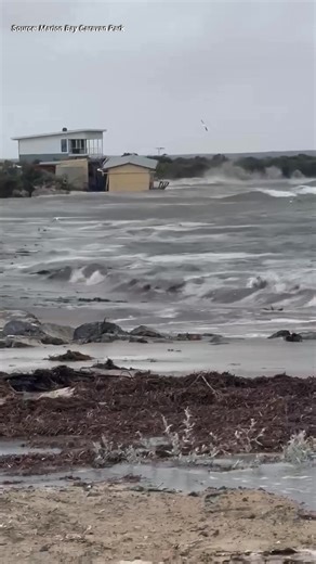 The Port Noarlunga jetty is closed to the public after huge waves during wild weather damaged part of the walkway, as a rural beachside shack is washed away 🤯 👉 Read more: https://bit.ly/4kBhXBC | The Advertiser