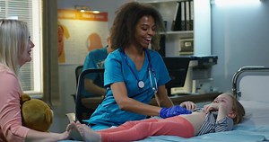 Young Female Doctor Examining Girl's Abdomen Stock Footage SBV-334693986 - Storyblocks
