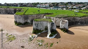 Botany Bay Beach in Broadstairs, Kent. Drone footage of the beach, bay, sea and chalk cliffs. Filmed on a sunny day in May.