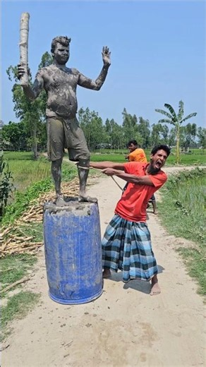 They tied a rope to the statue's feet.
