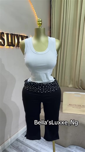 Poka dot capri : 16,500 White singlet top : 12,000