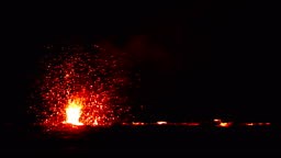 Hawaii's Kilauea Volcano lava flowing rapidly shown at Leilani...