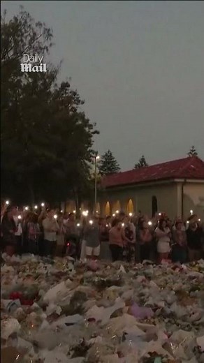 Australians sing 'Waltzing Matilda' at candlelight vigil