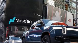 Nasdaq hits a record high