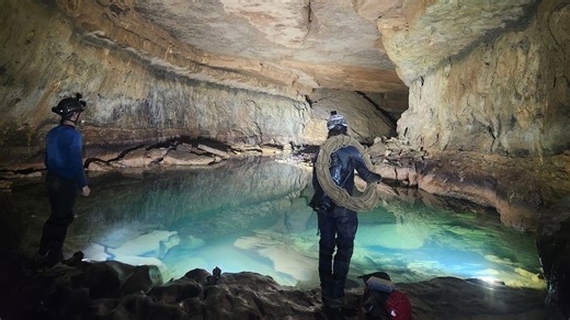 They descended a 280-foot waterfall inside a pitch-black river cave