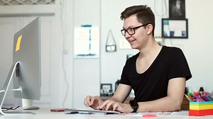 Man working from home on his computer - Free Stock Video