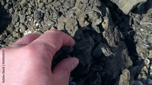 crumbling and cracking rock fragments under natural conditions, rock crumbling,