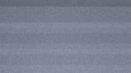 Loopable digital animation of Authentic static on a television screen