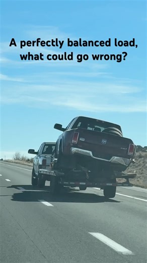 Wild Highway Moment: Wrecked Truck Barely Hanging On a Flatbed at 70 MPH