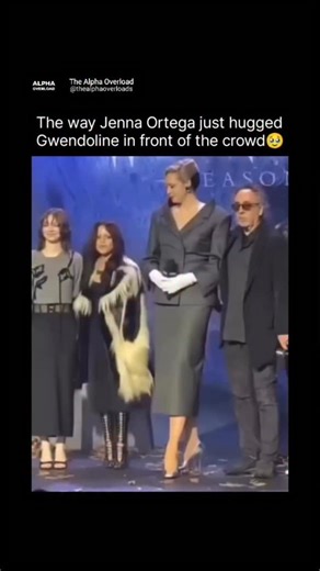 Alpha Overload on Instagram: "This video is a delightful combination of two viral hits that perfectly embody the internet’s dual love for wholesome celebrity connection and hilarious social awkwardness! The first part, featuring Jenna Ortega warmly hugging the much taller Gwendoline Christie, is simply beautiful. The genuine affection, the height difference that makes the hug look so endearing, and the public setting of the hug make it an instantly heartwarming moment of female friendship and mu