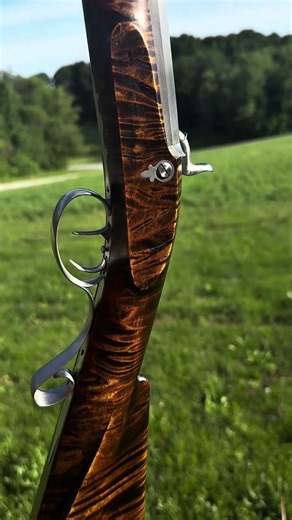 Whooooooeeeee!!! Look at that curly maple! A JK Hawken finished by our very own David S.