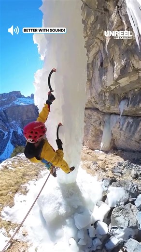 Defying gravity: Ice climbing adventure on a frozen cliff!