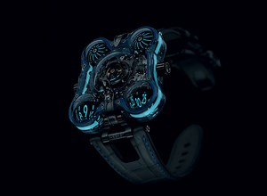 MB&F HM6 alien nation watch shimmers sci-fi glow beneath crystal form